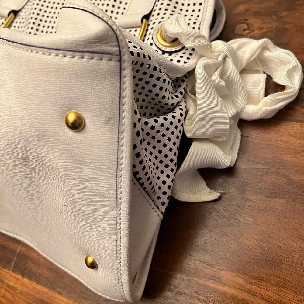 Juicy Couture White and Black Perforated Satchel
